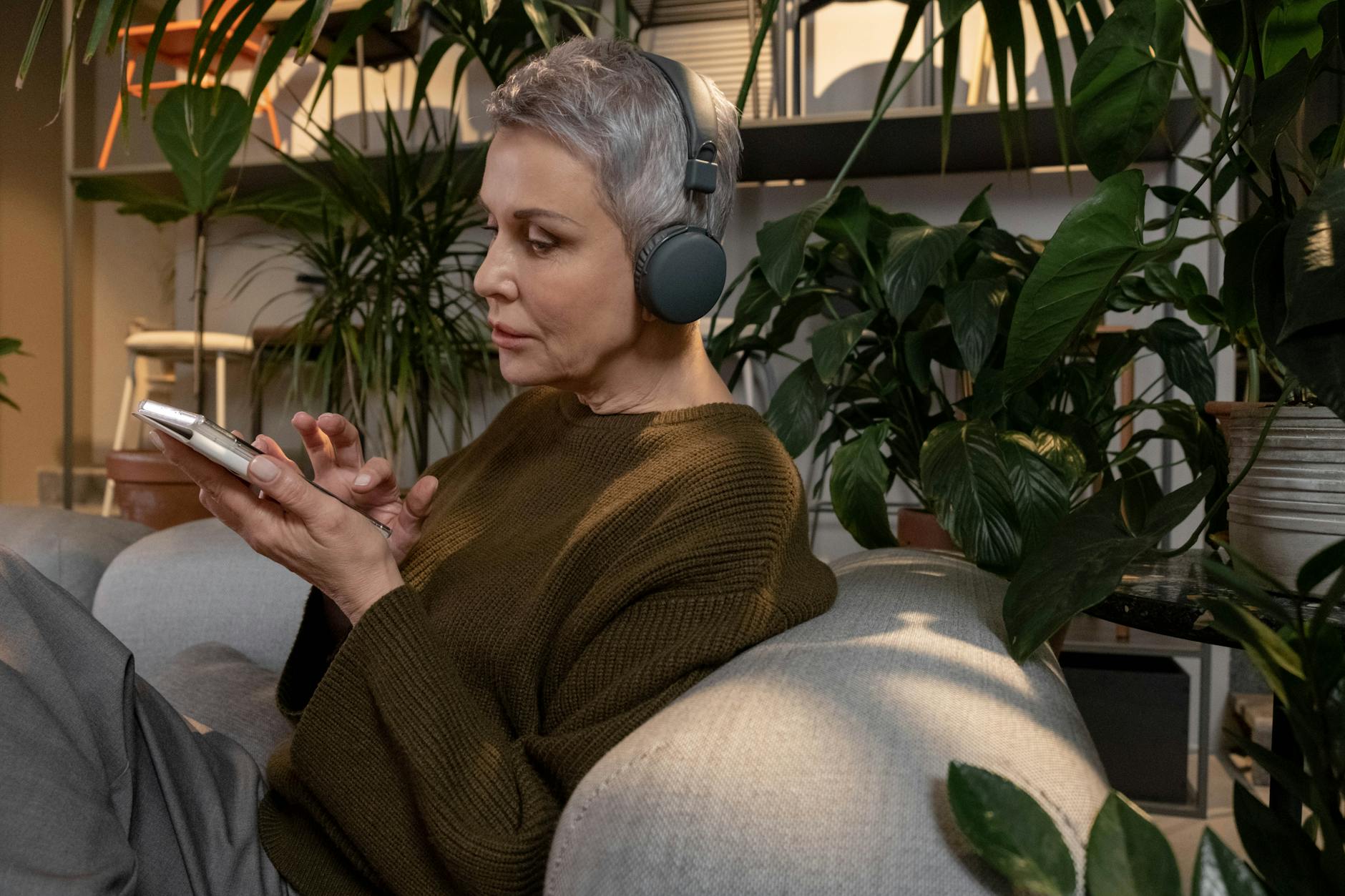 photo of an elderly woman listening to music