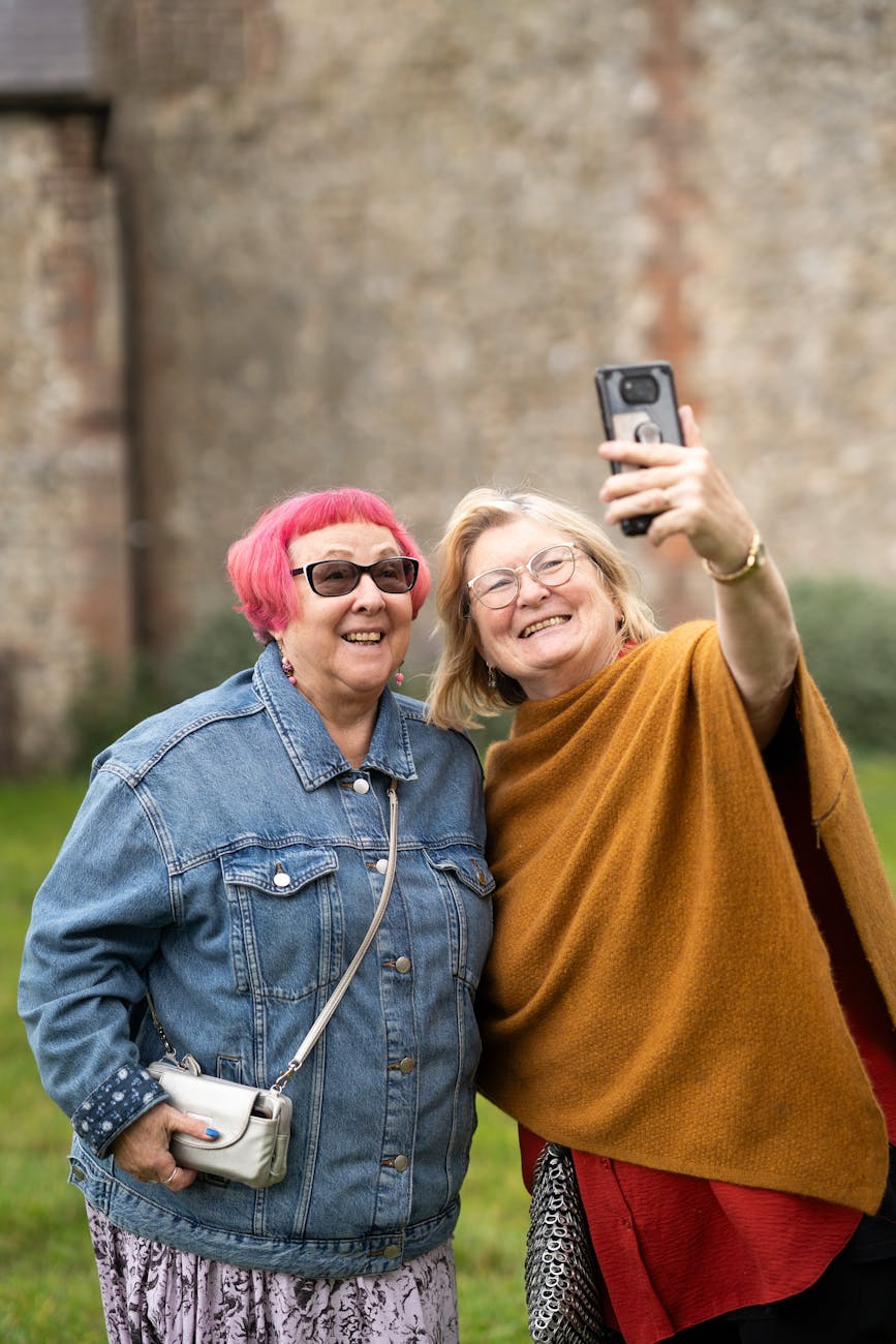 smiling women taking selfie